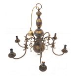 A large six-light ceiling-hanging brass candelabra (approx. 75 cm wide x 70 cm high (to suspension
