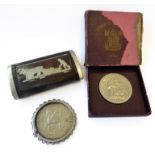 A trio of collectibles: a Festival of Britain 1951 crown (original box, some damage); an Elizabeth