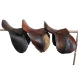 Three leather-lined saddles (17", 17½" and 18")