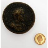 A bronze medallion of the Roman Emperor Septimius Severus (possibly a Grand Tour copy) and a 22-