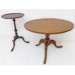 A circular-topped oak occasional table on tripod base (74cm wide), together with an 18th century