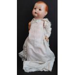 A large mid-20th century German doll: blue sleeping eyes within celluloid head marked 201-7 Germany,