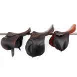 Three 17" leather-lined saddles