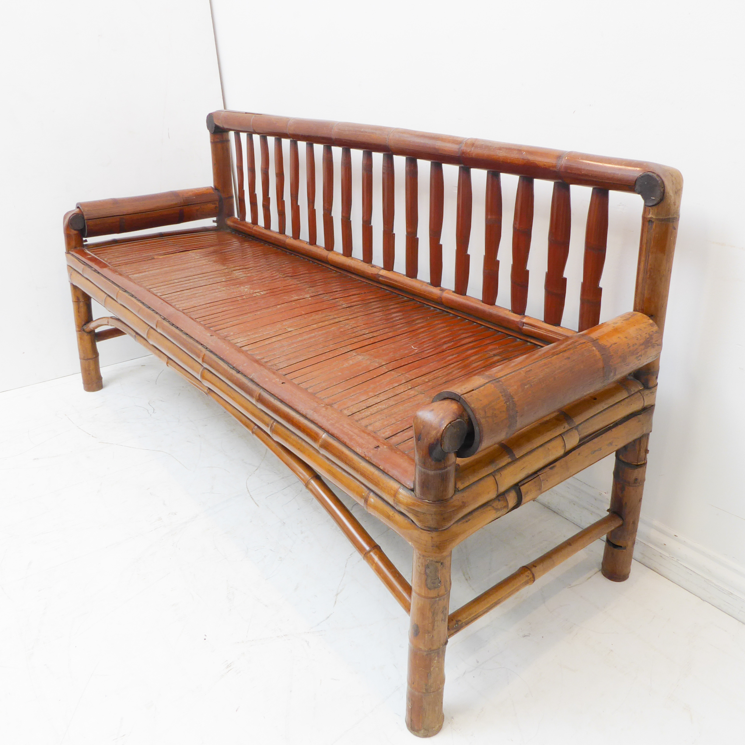 An unusual late 19th / early 20th century Chinese settle made from patinated bamboo: slatted back