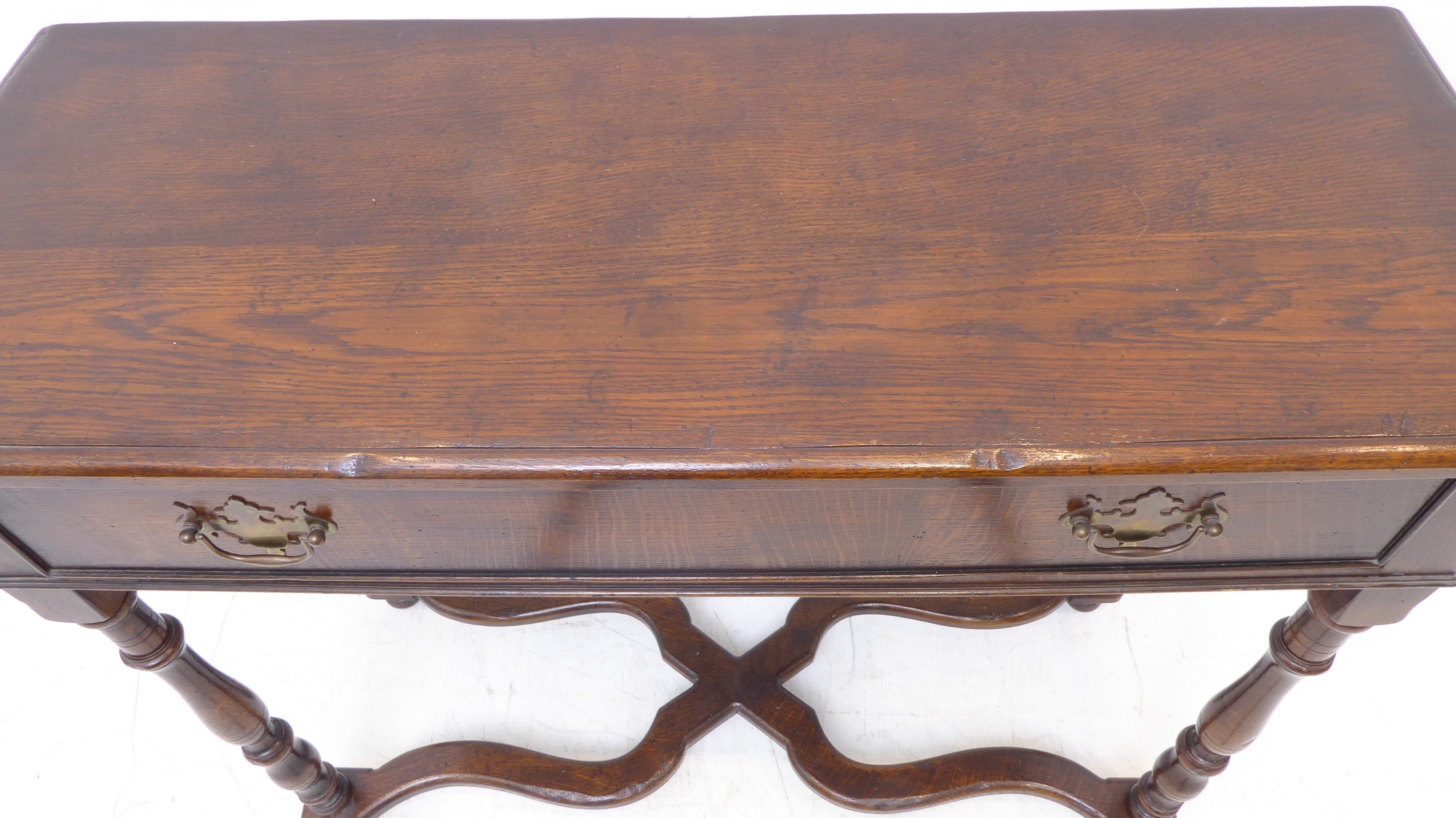 A good reproduction solid oak side-table: moulded top above a single full-width drawer with brass - Image 3 of 5