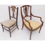 An Edwardian period mahogany and strung open armchair: pierced marquetry splat, over-stuffed seat