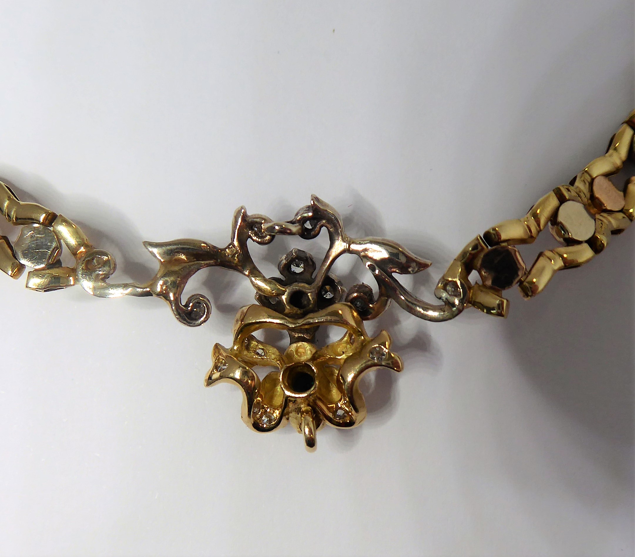 A 14-carat yellow gold (marked '585', Italy) openwork neck chain with an integral flowerhead style - Image 4 of 5