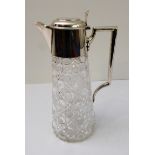 An Edward VII silver-mounted claret jug with hobnail-cut glass decoration: pierced thumb-piece and