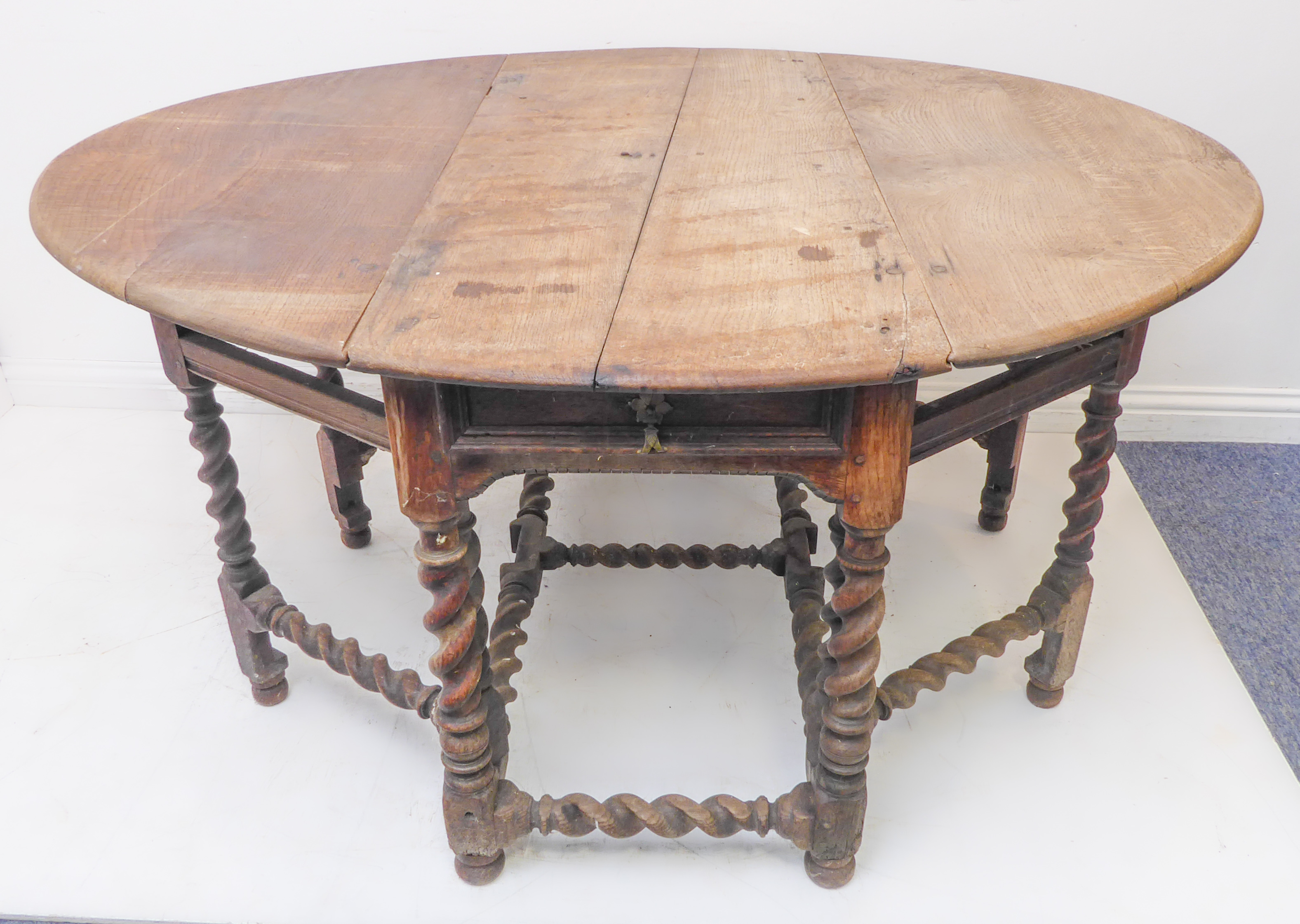 A large oval-topped double-gateleg drop-leaf table with single end-drawer; probably late 17th or - Image 5 of 6
