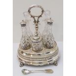 A late 19th century silver-plated six-bottle cruet set on stand: three cut-glass bottles and