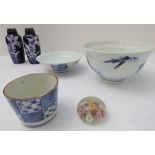 A group of five comprising: a Chinese porcelain bowl and cover decorated in underglaze blue with