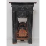 A 19th century Art Nouveau black cast-iron fire-grate decorated with stylised heart motifs (92 x