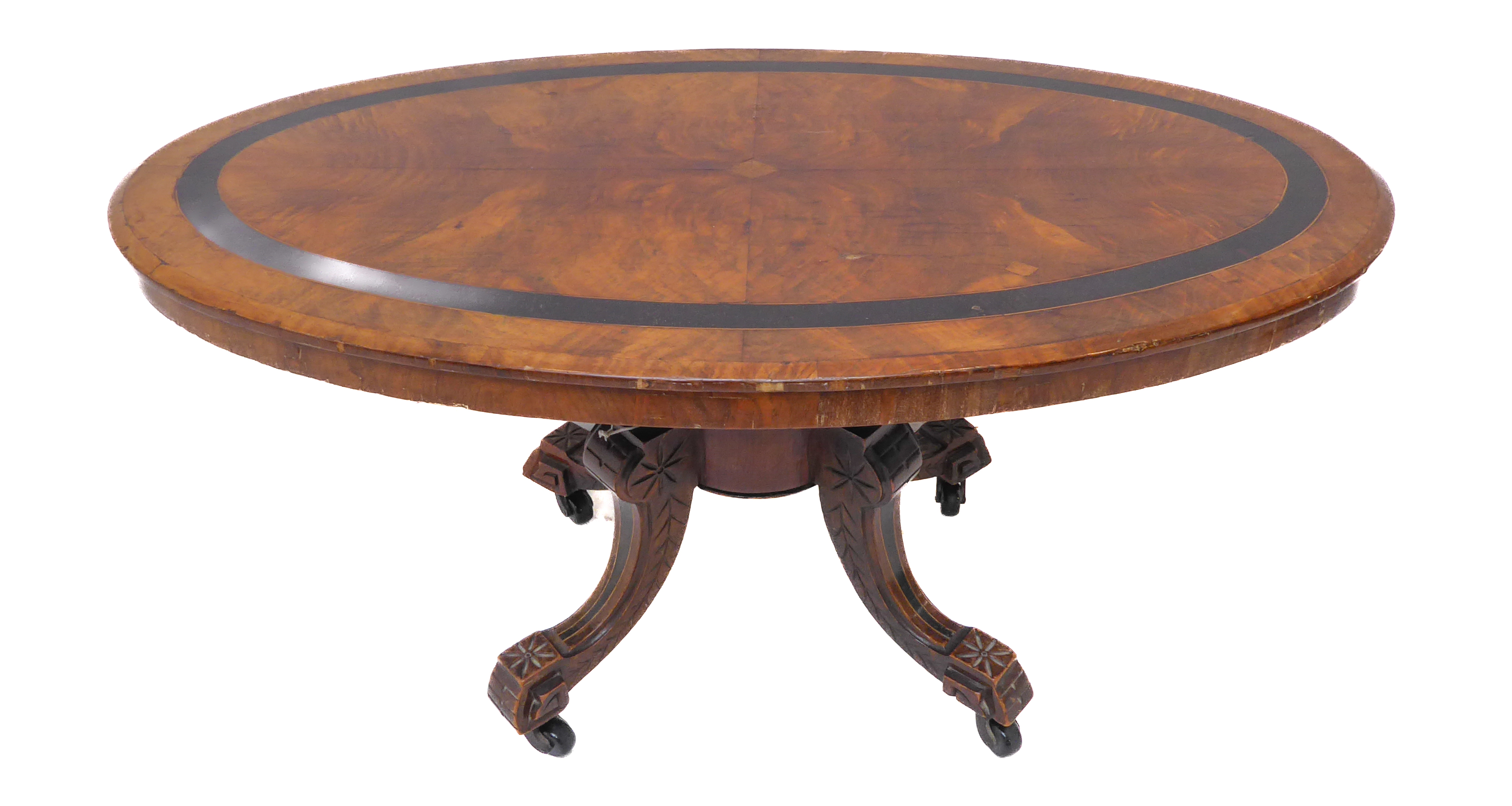 A 19th century oval walnut and banded coffee/occasional table on four carved, downswept legs