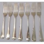 A harlequin set of seven late Georgian or early Victorian hallmarked silver table-forks (mostly