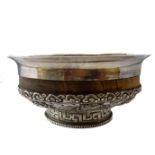 A Chinese silver export ware bowl of hardwood mounted with silver decorated with eight Chinese