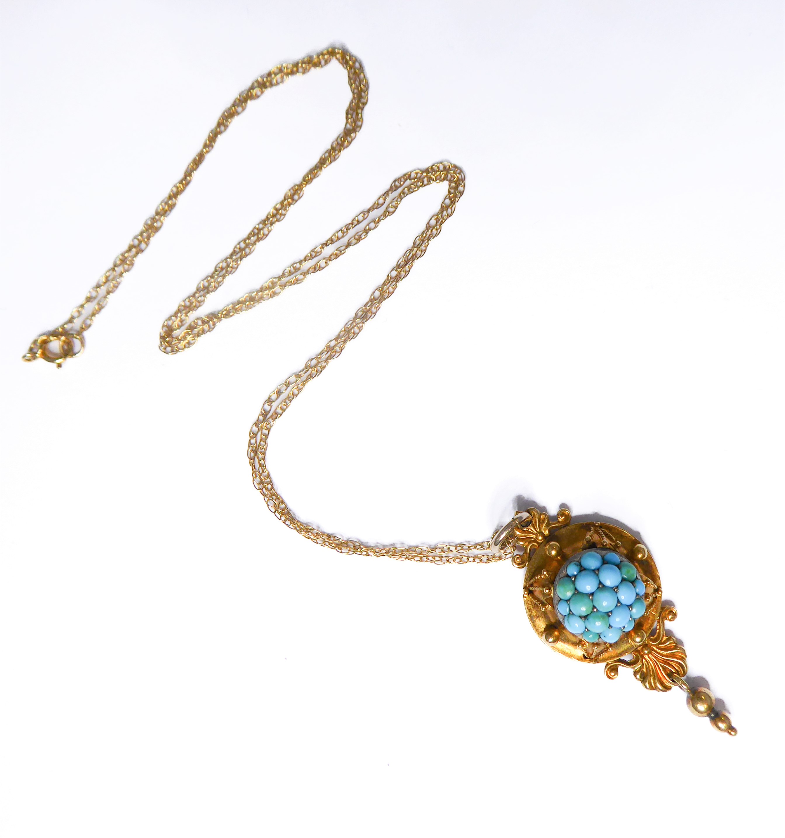 A Victorian gold and turquoise pendant and chain