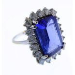 An 18-carat white gold, tanzanite and diamond cluster ring, size P