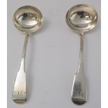 A pair of hallmarked silver fiddle-pattern ladles, assayed London 1818