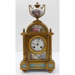 A 19th century French gilt-metal-mounted and porcelain eight-day mantle clock: the domed top
