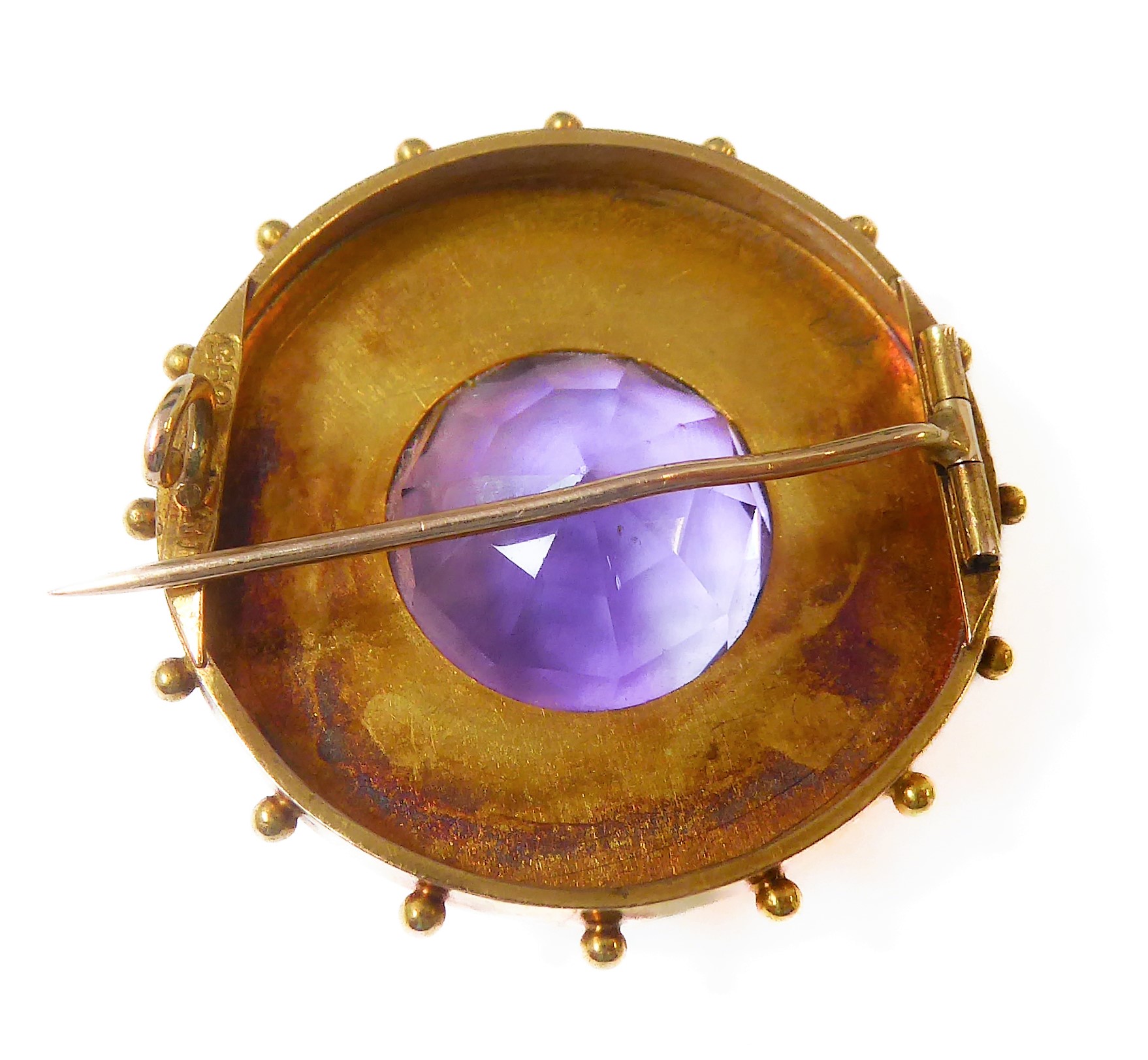 A mid-19th century amethyst and yellow-gold brooch: the central circular mixed-cut amethyst collet- - Image 2 of 2