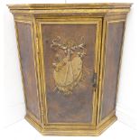 A good late 19th/early 20th century painted hanging corner cupboard: the central door painted with