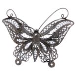 An unusual silver filigree brooch modelled as a butterfly