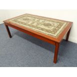 A stylish walnut / teak coffee-table inlaid with glazed tiles, signed and dated '76 lower right (133