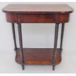 A 19th century mahogany side table on annulated legs and with conforming undertier (65cm wide x 31.