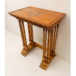 A set of four satinwood and rosewood-crossbanded quartetto tables: the smallest table with applied