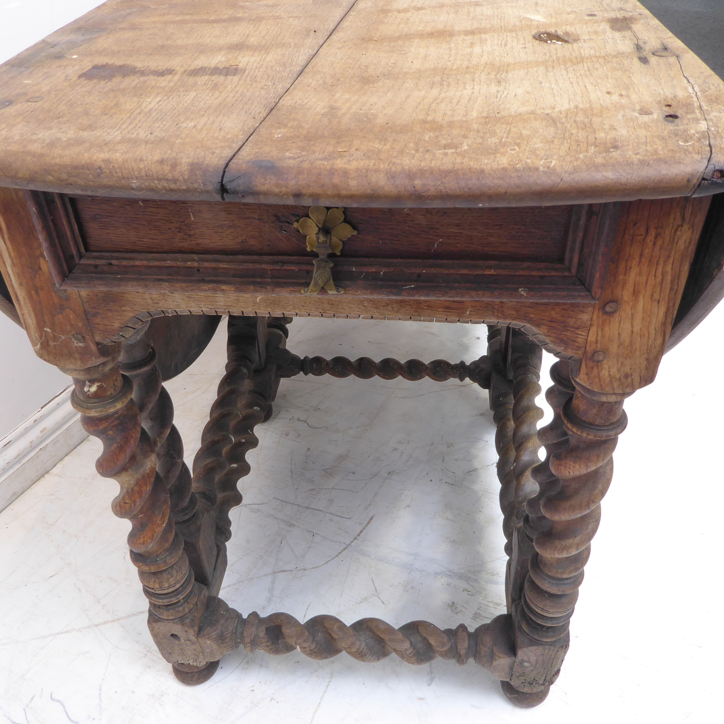 A large oval-topped double-gateleg drop-leaf table with single end-drawer; probably late 17th or - Image 4 of 6