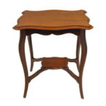 An early 20th century serpentine-topped walnut occasional table on cabriole legs united by a smaller