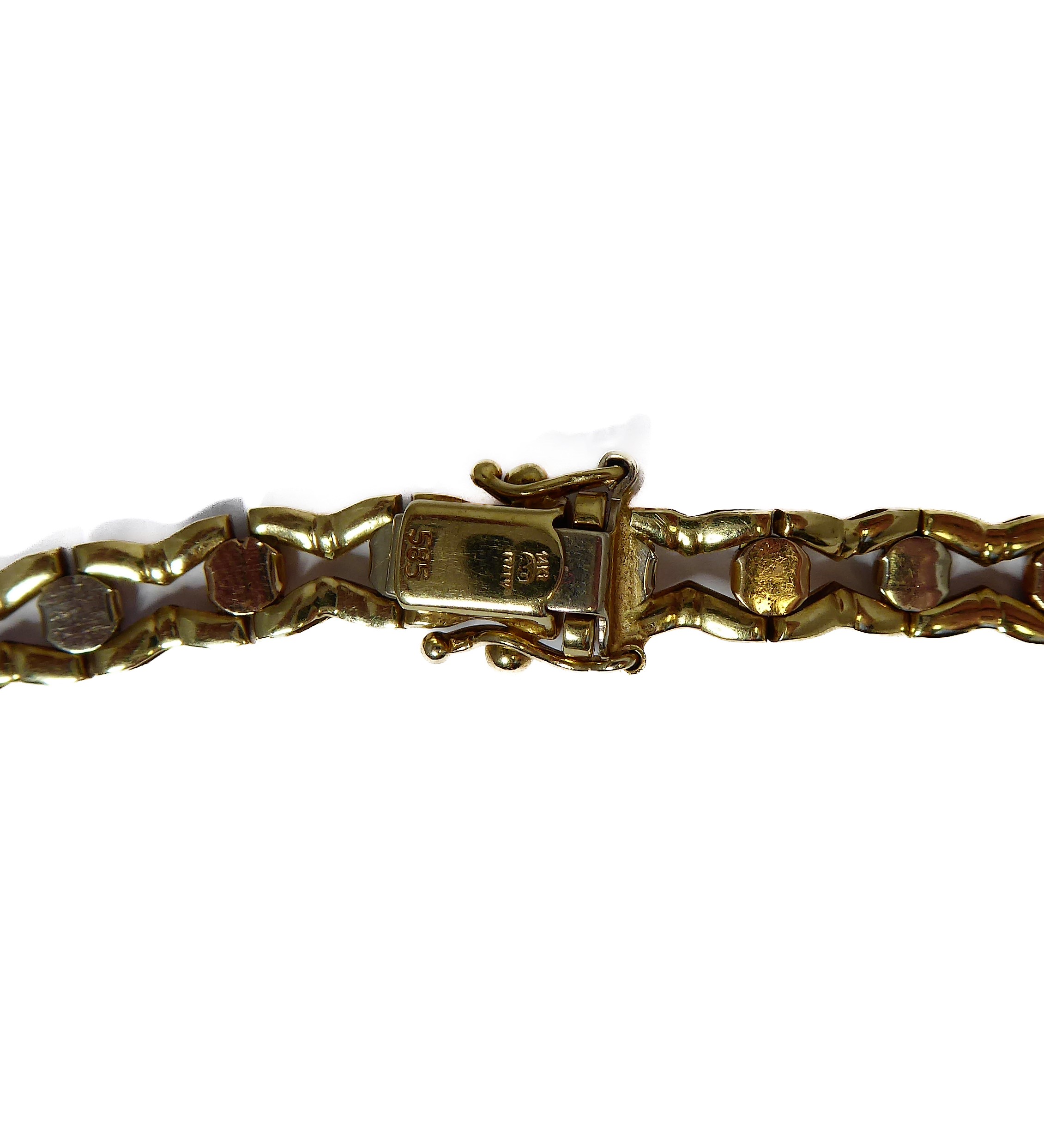 A 14-carat yellow gold (marked '585', Italy) openwork neck chain with an integral flowerhead style - Image 5 of 5