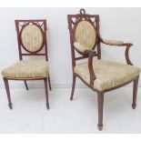 Two Edwardian Sheraton Revival salon chairs decorated with carved swags and tassels above horse-hair