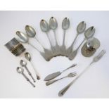 A selection of silverware to include: hallmarked silver flatware; a hallmarked silver napkin ring; a