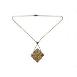 To be sold in aid of the Marie Curie charity. An Edwardian peridot and seed pearl openwork cluster