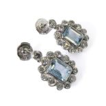 A pair of aquamarine (3.5 carat) and diamond (2.5 carat) cluster white gold earrings