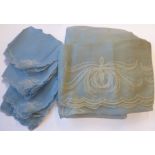 A powder-blue embroidered chiffon-effect tablecloth and 12 matching napkins (tablecloth 267cm x