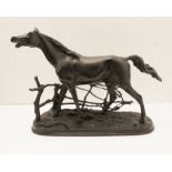 A cast-iron Russian model model of a stallion within a branch fence (dated 1969 to the underside) (