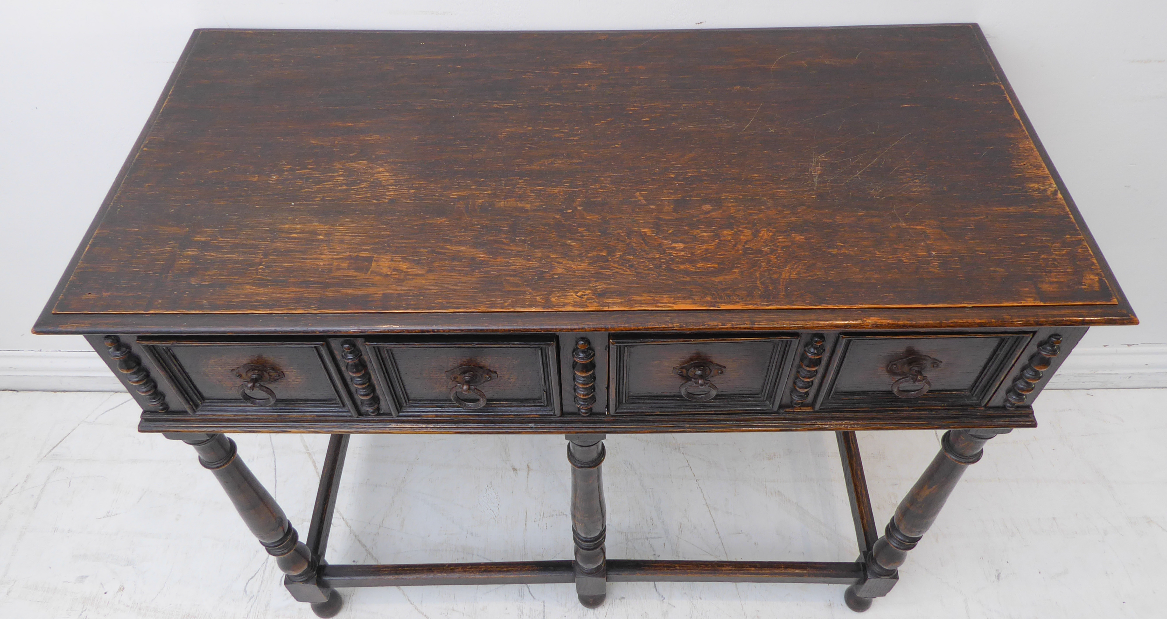 An early 20th century oak side table in late 17th century style: the moulded top above two half- - Image 4 of 5
