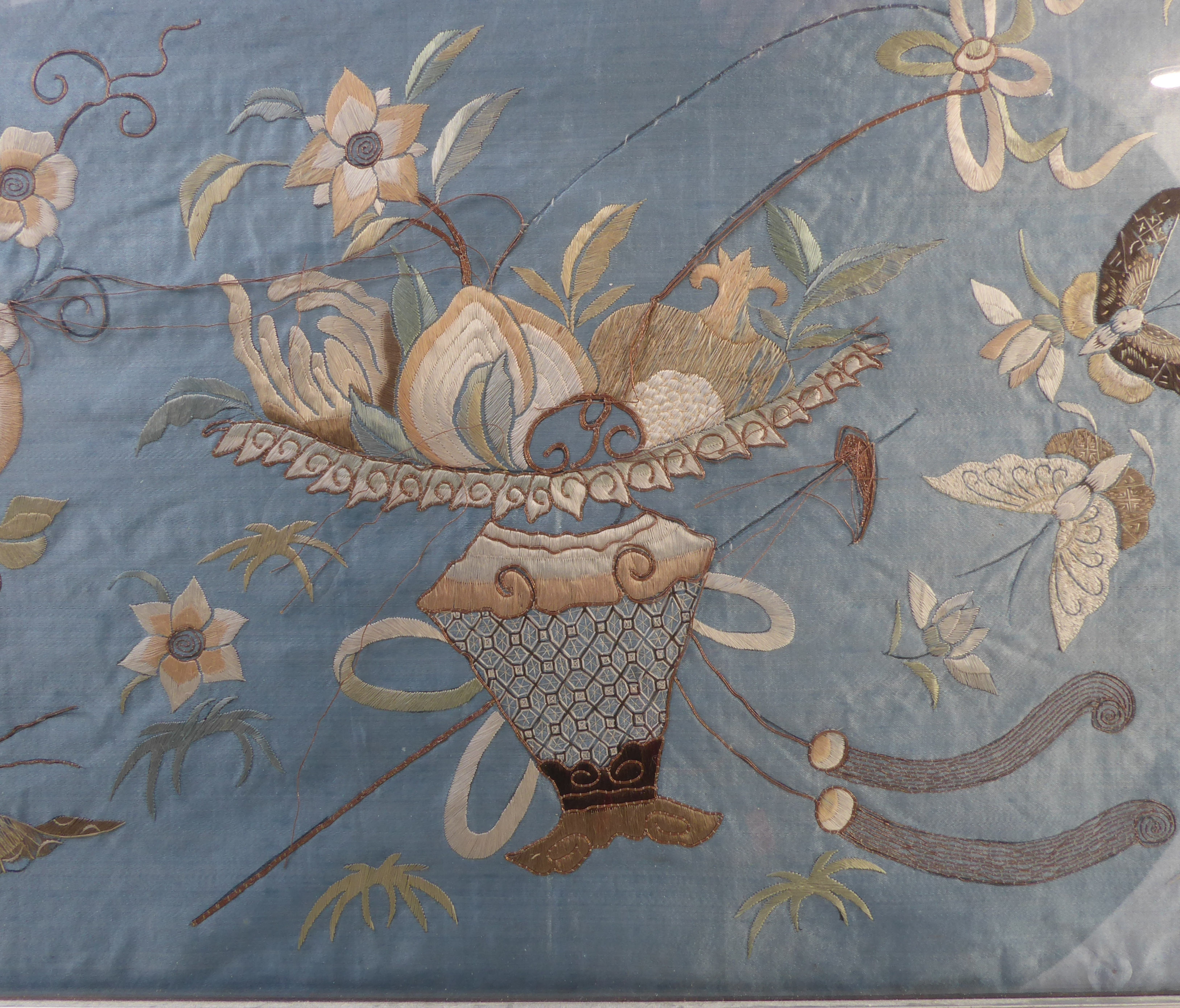 A pair of silver framed and glazed (later) Chinese embroideries on silk: each depicting a central - Image 2 of 4