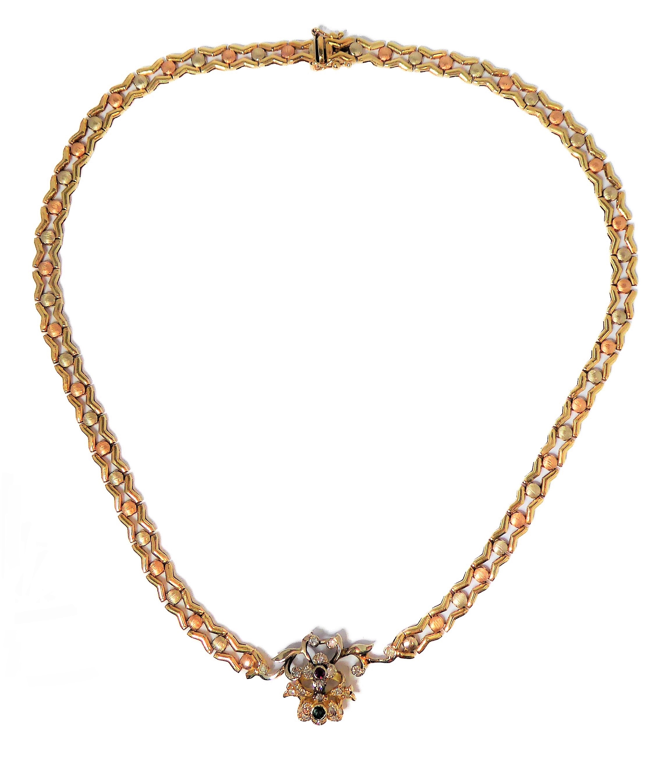 A 14-carat yellow gold (marked '585', Italy) openwork neck chain with an integral flowerhead style