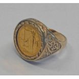 9CT GOLD RING INSET WITH 1987 TENTH OUNCE GOLD BRITANNIA - RING SIZE P ,