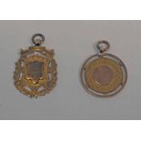 2 9CT GOLD MEDALLIONS - 8.