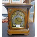 MAHOGANY CASED MANTLE CLOCK WITH BRASS & SILVERED DIAL.