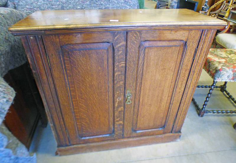 LATE 19TH CENTURY OAK CABINET WITH 2 PANEL DOORS Condition Report: Rear has been