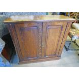 LATE 19TH CENTURY OAK CABINET WITH 2 PANEL DOORS Condition Report: Rear has been