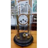 EARLY 20TH CENTURY GLASS DOMED BRASS MANTLE CLOCK WITH WHITE ENAMEL DIAL SIGNED WILSON 34CM TALL