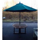 HARDWOOD FOLDING OCTAGONAL GARDEN TABLE & BROLLY Condition Report: Will sit 4