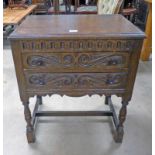 OAK 2-DRAWER CHEST ON TURNED SUPPORTS WITH LINEN FOLD DECORATION - 61CM WIDE