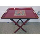 RED LACQUER & GILT BUTLERS TRAY TABLE WITH CLASSICAL SCENE IN TOP